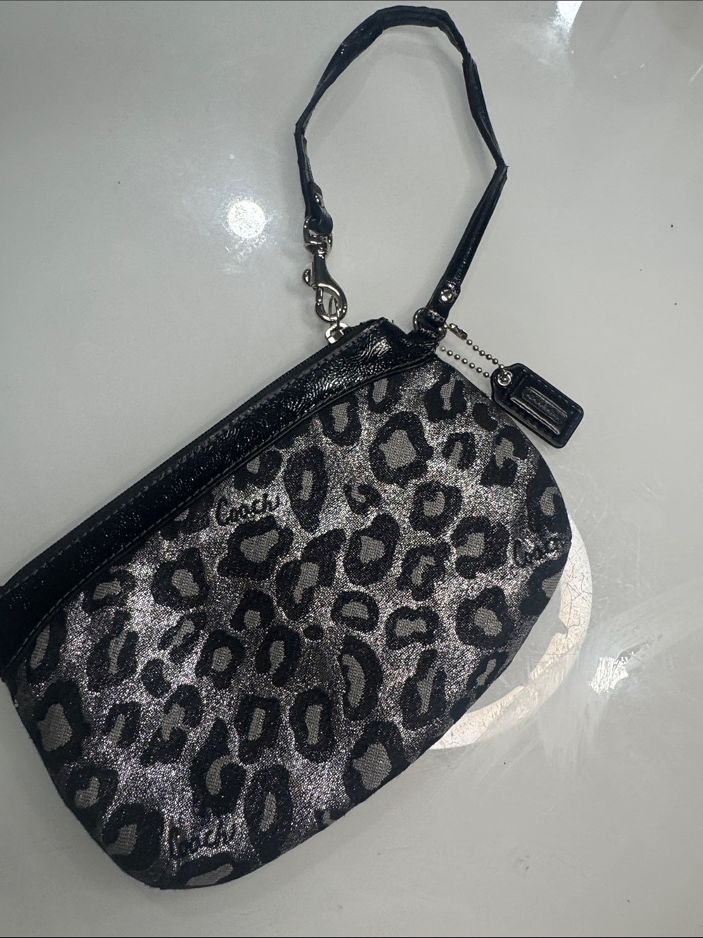 Coach Metallic Silver and Black Leopard Wristlet